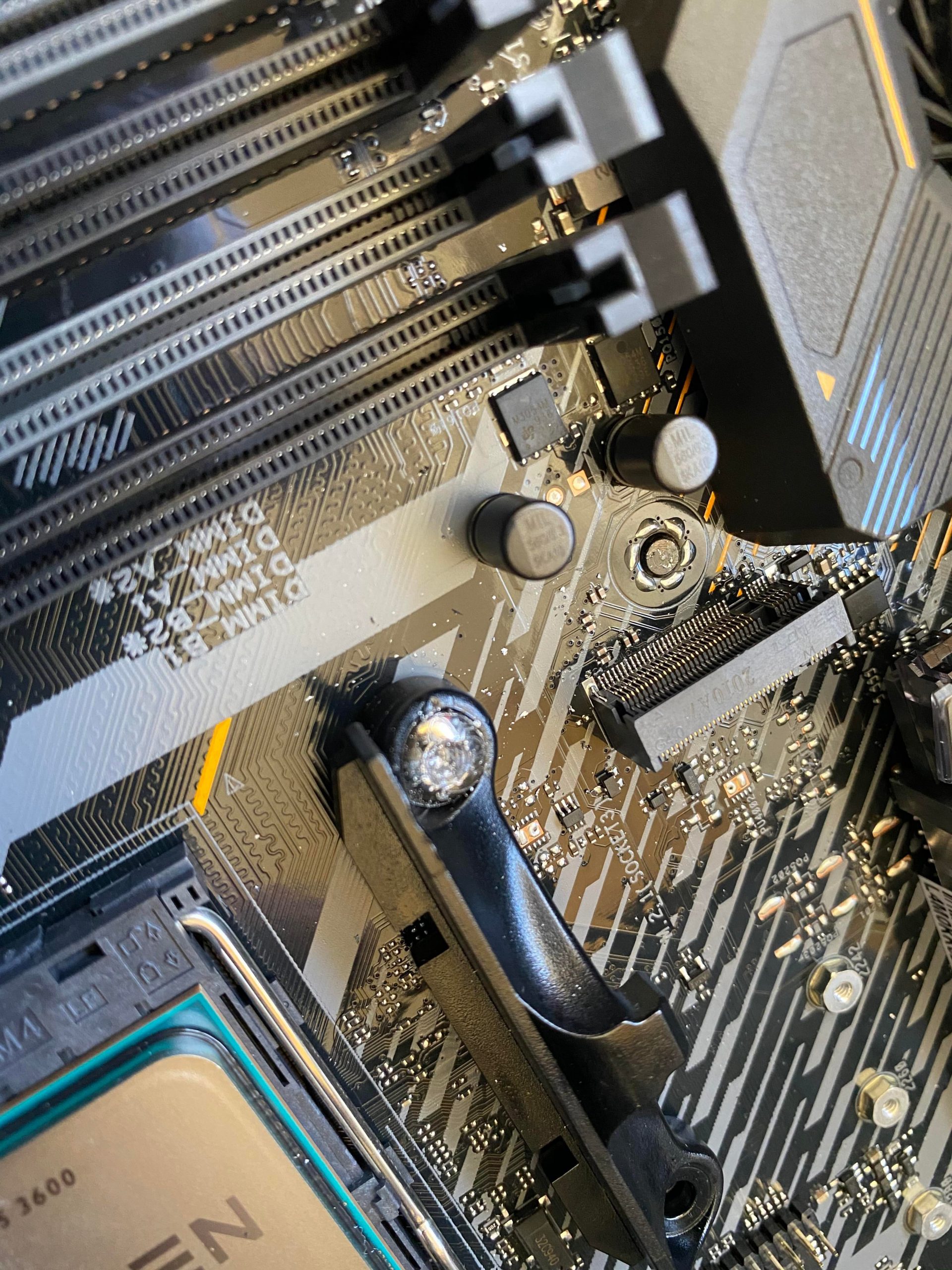 How to unscrew stripped motherboard screw????