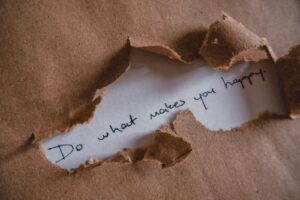 Blogging: What Do You Know When It Comes To Blogging? 2 Blogging: Brown paper revealing message 'Do what makes you happy.'